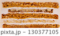 Delicious layered dessert with cake and creamy filling at a bakery 130377105