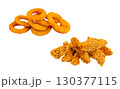 Crispy onion rings and golden chicken tenders served for casual dining snacks 130377115