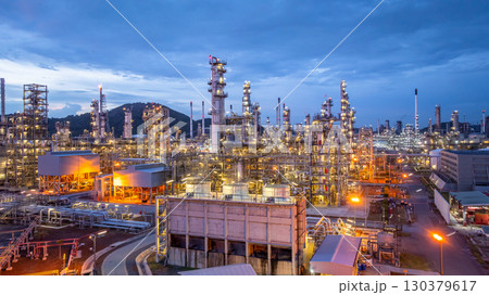 Aerial view oil and gas refinery plant at night, Global business energy logistic transportation, Oil and gas refinery petrochemical industrial, Petrochemical refinery industrial energy supply chain. 130379617