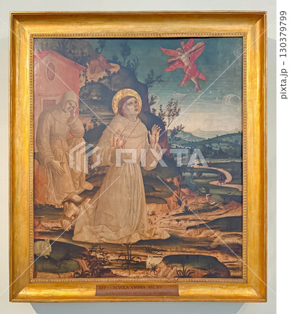 VATICAN CITY, ROME, ITALY - AUGUST 02, 2025 Umbrian School painting of Saint Francis receiving the stigmata, depicts a kneeling prayer receiving the wounds of Christ VATICAN CITY, ROME, ITALY - AUGUST 02, 2025 Umbrian School painting of Saint Francis receiving the stigmata, depicts a kneeling prayer receiving the wounds of Christ 130379799