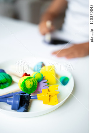 Colorful children art tools on a plate for creative play Colorful children art tools on a plate for creative play 130379848