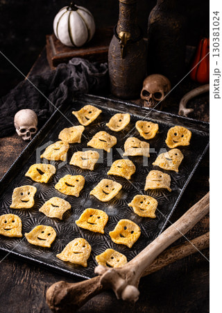 Halloween chips in shape of ghost Halloween chips in shape of ghost 130381024