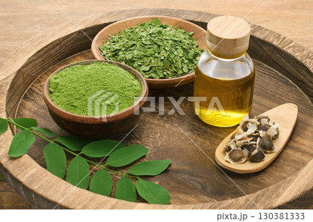 Moringa Products Display on wooden background Moringa Products Display on wooden background 130381333