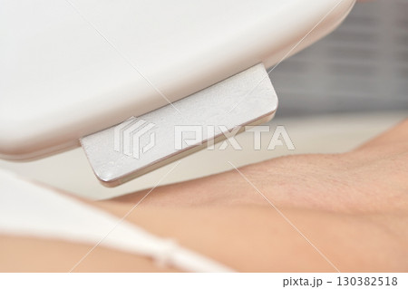 Laser hair removal on female skin with advanced cosmetic procedure for smooth 130382518