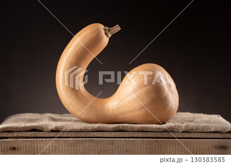 Crookneck Butternut Squash On Wooden Crate With Dark Background 130383585