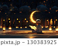 Little Muslim boy reads the Quran under the moon and stars. 130383925
