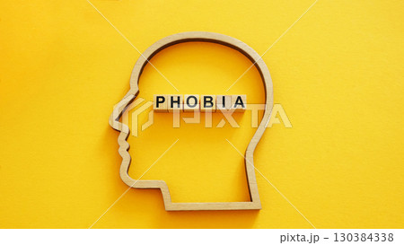 Head outline with the word phobia. Mental health and psychological fear. 130384338