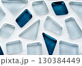 Transparent blue ice-like geometric shapes in abstract mosaic composition 130384449
