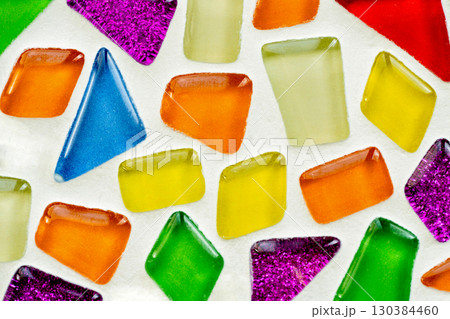 Colorful abstract mosaic with glossy and glittering geometric shapes on white 130384460