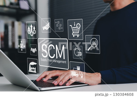SCM, Supply Chain Management and Logistics System Concept. Person using laptop with icons representing supply chain management, logistics, procurement, inventory, distribution, manufacturing processes SCM, Supply Chain Management and Logistics System Concept. Person using laptop with icons representing supply chain management, logistics, procurement, inventory, distribution, manufacturing processes 130384608