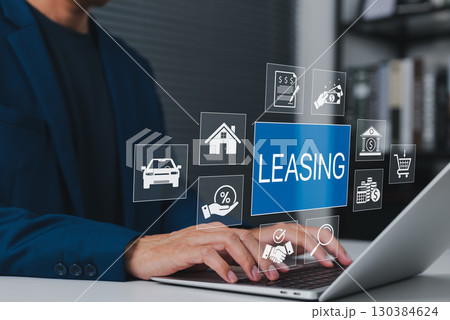 Leasing and Financial Service Concept. Businessman using laptop with icons related to leasing, finance, housing, automotive, interest rates, and monthly payments. lease agreement, leasing car, 130384624
