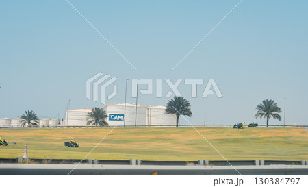 Aerial view Oil storage tank In industrial areas. Crude oil storage plant For export. Palm oil factories in Asia. Within the industrial plant. Zone tank storage industrial. Palm plantation . High 130384797