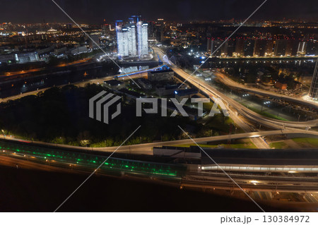 City at night with green light. 130384972