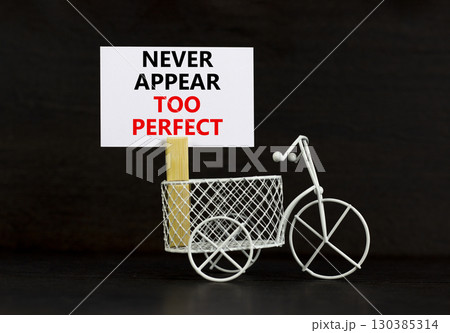 Never appear too perfect symbol. Concept words Never appear too perfect on beautiful white paper. Beautiful black background. Miniature bicycle. Business never appear too perfect concept. Copy space. Never appear too perfect symbol. Concept words Never appear too perfect on beautiful white paper. Beautiful black background. Miniature bicycle. Business never appear too perfect concept. Copy space. 130385314