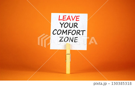 Leave your comfort zone symbol. Concept words Leave your comfort zone on beautiful white paper. Beautiful orange paper background. Business psychological Leave your comfort zone concept. Copy space. 130385318