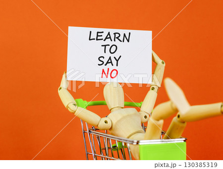 Learn to say no symbol. Concept words phrase Learn to say no on beautiful white card. Businessman's model. Beautiful orange paper background. Business psychological Learn to say no concept. Copy space 130385319