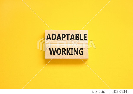 Adaptable working symbol. Concept words Adaptable working on beautiful wooden block. Beautiful yellow paper background. Business Adaptable working concept. Copy space. Adaptable working symbol. Concept words Adaptable working on beautiful wooden block. Beautiful yellow paper background. Business Adaptable working concept. Copy space. 130385342