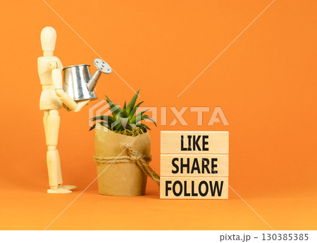 Like share follow symbol. Concept words Like Share Follow on beautiful wooden blocks. Beautiful orange background. Businessman model. Business like share follow concept. Copy space. Like share follow symbol. Concept words Like Share Follow on beautiful wooden blocks. Beautiful orange background. Businessman model. Business like share follow concept. Copy space. 130385385