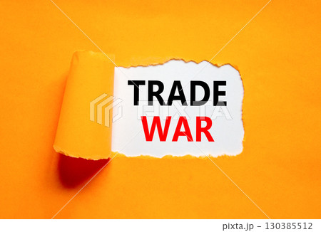 Trade war symbol. Concept word Trade war on beautiful white paper. Beautiful orange paper background. Business trade war concept. Copy space. 130385512