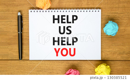 Help you symbol. Concept words phrase Help us help you on beautiful white note. Colored paper. Beautiful wooden background. Business Help you concept. Copy space. Help you symbol. Concept words phrase Help us help you on beautiful white note. Colored paper. Beautiful wooden background. Business Help you concept. Copy space. 130385521