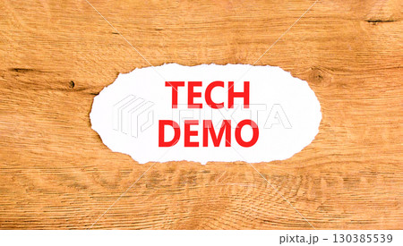 Tech demo symbol. Concept word Tech demo on beautiful white paper. Beautiful wooden paper background. Business tech demo concept. Copy space. 130385539