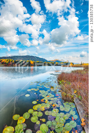Amazing view of Wagenbruchsee (Geroldsee) lake with Wetterstein mountain range on background. Amazing view of Wagenbruchsee (Geroldsee) lake with Wetterstein mountain range on background. 130385738
