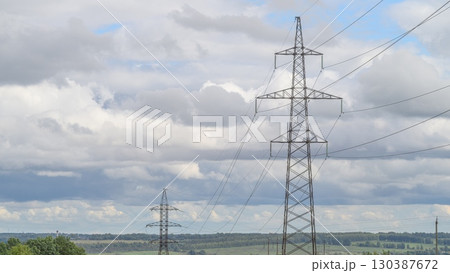 Power Lines Below a Dramatic and Beautiful Sky with Amazing Cloud Formations Above Them Power Lines Below a Dramatic and Beautiful Sky with Amazing Cloud Formations Above Them 130387672