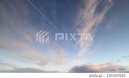 A Beautiful and Dreamy Cloudy Sky at Dusk, Perfect for Capturing Breathtaking Moments A Beautiful and Dreamy Cloudy Sky at Dusk, Perfect for Capturing Breathtaking Moments 130387691