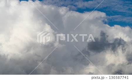 Dramatic and Stunning Cloud Formations Set Against a Bright and Expansive Blue Sky Above Dramatic and Stunning Cloud Formations Set Against a Bright and Expansive Blue Sky Above 130387741