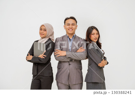 Professional Business Team Confidently Displaying Diversity in Corporate Attire 130388241