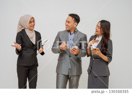 A Professional Team is Collaborating Effectively in a Modern Office Setting 130388385