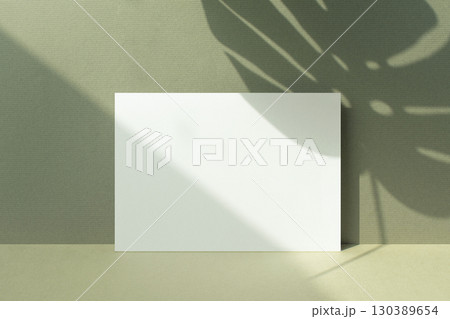 Card mockup with autumn color background and plant shadow 130389654