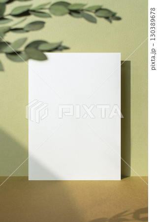 Card mockup with autumn color background and plant shadow 130389678