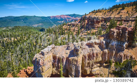 Aerial Dramatic Rock Formations Pine Forest and Mountain Landscape 130389742