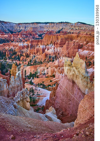 Bryce Canyon Hoodoos and Canyon Trails at Sunrise in Utah 130389968