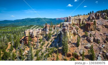 Aerial Red Rock Cliffs and Forested Mountains in Dixie National Forest Utah Aerial Red Rock Cliffs and Forested Mountains in Dixie National Forest Utah 130389976
