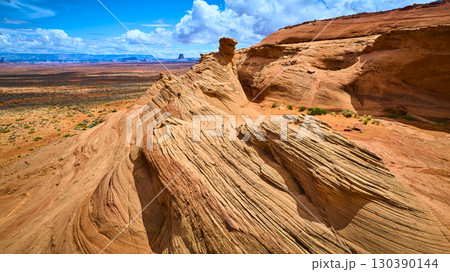 Aerial Fly Through Sandstone Formations and Desert Plains with Dramatic Sky Aerial Fly Through Sandstone Formations and Desert Plains with Dramatic Sky 130390144