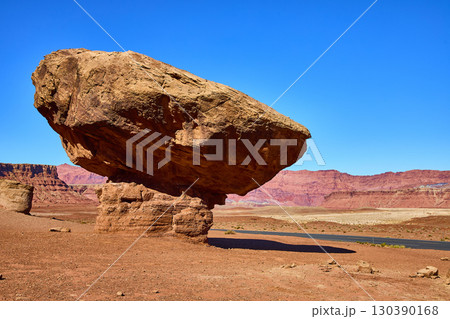 Balanced Rock Formation with Desert Road and Red Mesas Eye Level Perspective Balanced Rock Formation with Desert Road and Red Mesas Eye Level Perspective 130390168