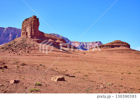 Red Sandstone Butte and Mesa in Desert Wilderness with Blue Sky Eye Level View 130390393