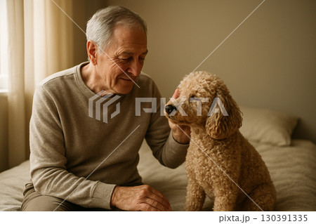 AI generated elderly man sitting with poodle on bed in warm natural light lifestyle scene showing peaceful and intimate bonding moment in cozy bedroom atmosphere 130391335