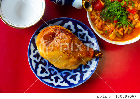 Popular Central Asian baked dish Samsa with lamb Popular Central Asian baked dish Samsa with lamb 130395067