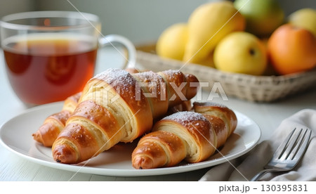 Nutritious Breakfast Table Of Golden Croissants Served With Fresh Berries Tea 130395831