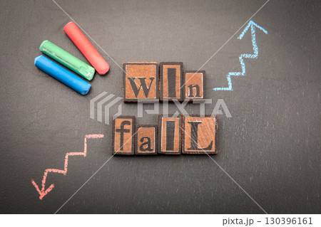 Concept image illustrating success and failure with chalk-drawn arrows pointing upward and downward  130396161