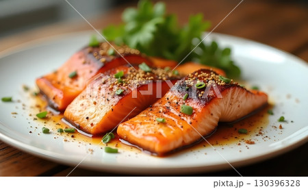 Fine Dining Presentation of Gourmet Salmon with Mediterranean Flavors 130396328