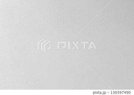 Clean white background showing simple texture of material used for house wall. calm surface provides serene and minimalist feeling for any design project Clean white background showing simple texture of material used for house wall. calm surface provides serene and minimalist feeling for any design project 130397490