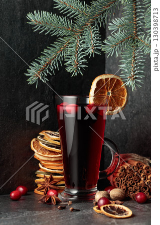 Hot Christmas drink with ingredients. 130398713