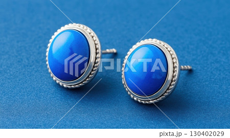 Elegant Lapis Lazuli Earrings Showcasing Vivid Blue Color Against a Smooth Background for Sophisticated Fashion Accessory 130402029