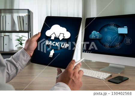 Cloud technology backup concept with a perso Cloud technology backup concept with a perso 130402568