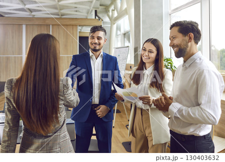 Business people standing in office making successful shaking hands finishing meeting. 130403632