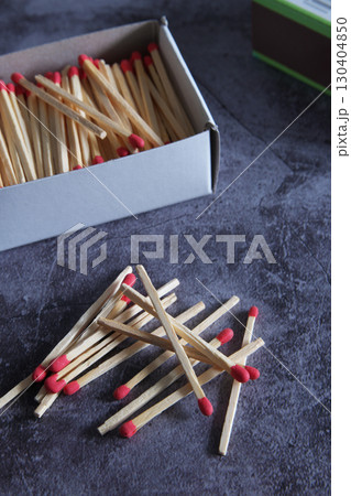 Open wooden matchbox on a dark background Open wooden matchbox on a dark background 130404850